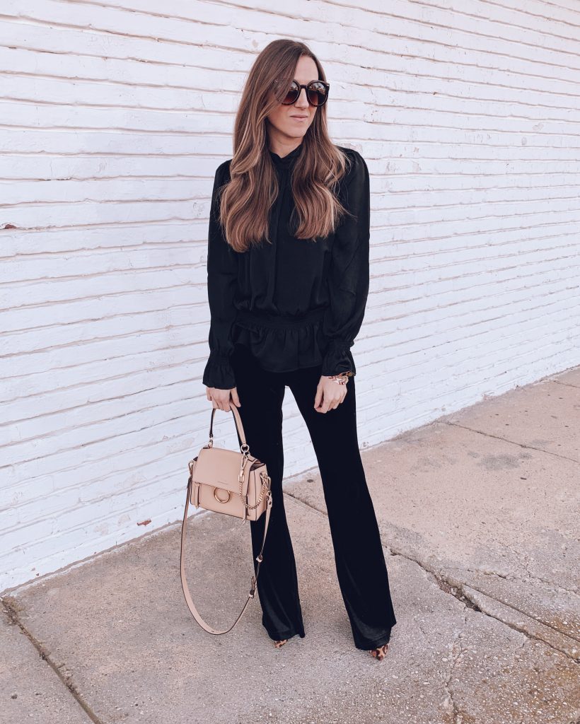 all black chic comfortable holiday christmas party outfit